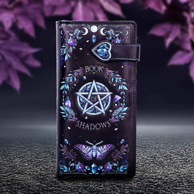 Purse with 'Book of Shadows' design featuring a pentagram and butterfly on a dark background.