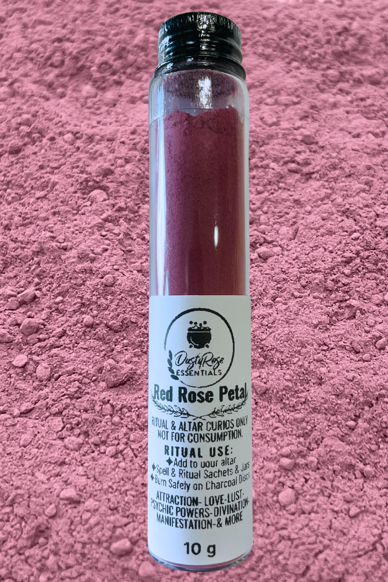red rose petal powder from Dusty Rose Essentials in a glass jar with red rose petal powder in the background